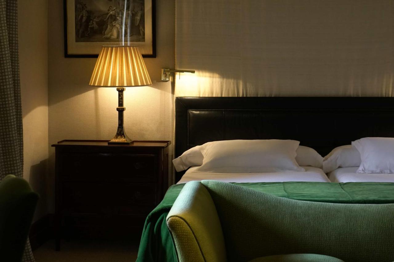 Landa Hotel Burgo Kültér fotó A bedroom at the hotel